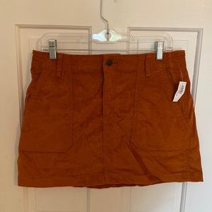 burnt orange corduroy mini skirt - size 10
